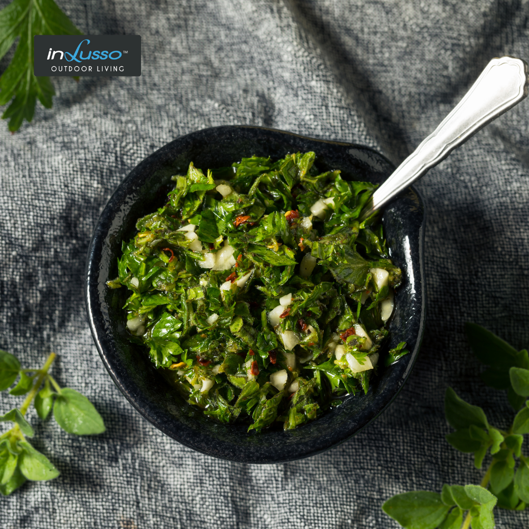 A bowl of South American Chimichurri sauce with parsley, garlic and olive oil
